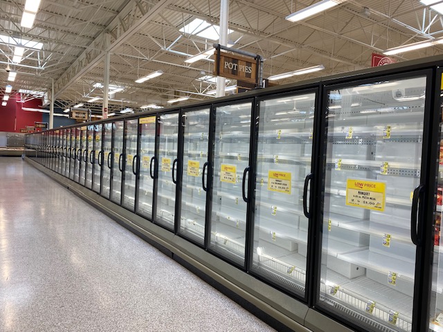 an empty supermarket aisle