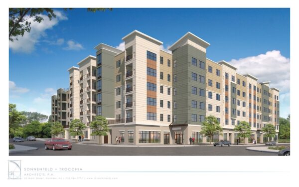 A rendering of a multi-story development against a blue sky in Pawtucket, Rhode Island.