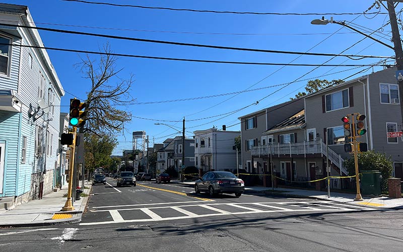 Sunny, mostly treeless Chelsea intersection