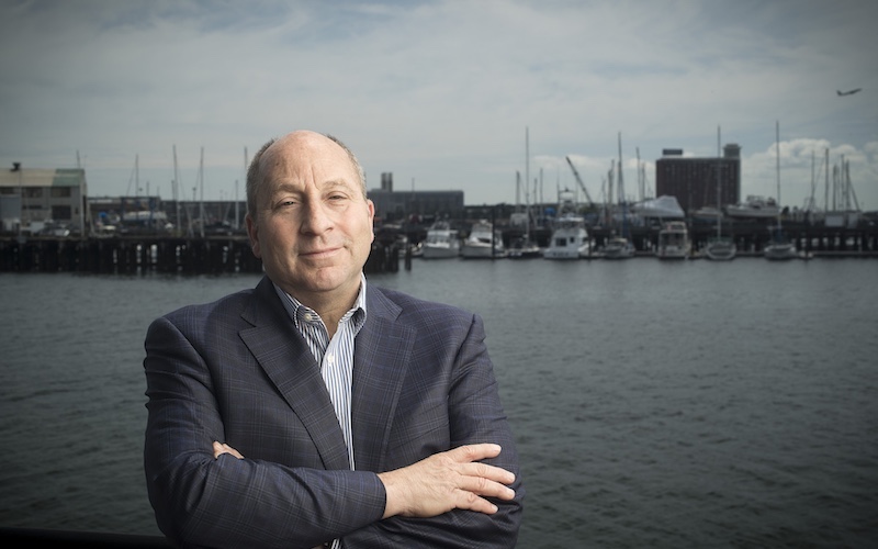 Brad Campbell standing at waterfront in East Boston